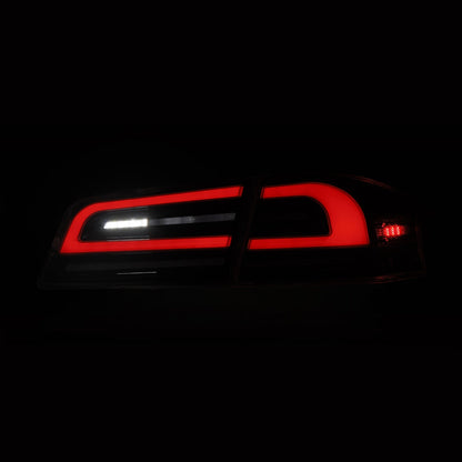 12-21 Tesla Model S LUXX-Series LED Tail Lights Alpha-Black (With Black Trunk Center Piece Replacement)