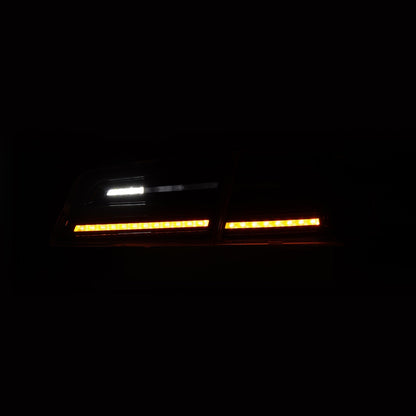 12-21 Tesla Model S LUXX-Series LED Tail Lights Alpha-Black (With Black Trunk Center Piece Replacement)