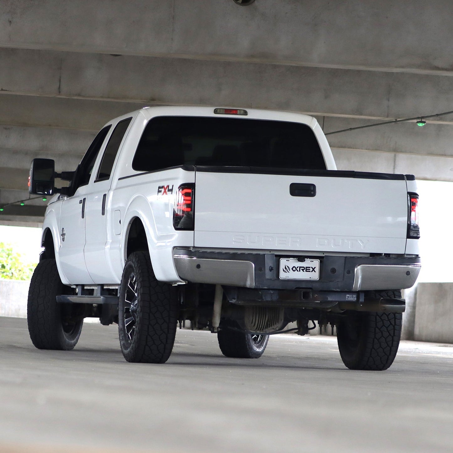 99-16 Ford Super Duty / 97-03 F150 LUXX-Series LED Tail Lights Black Red